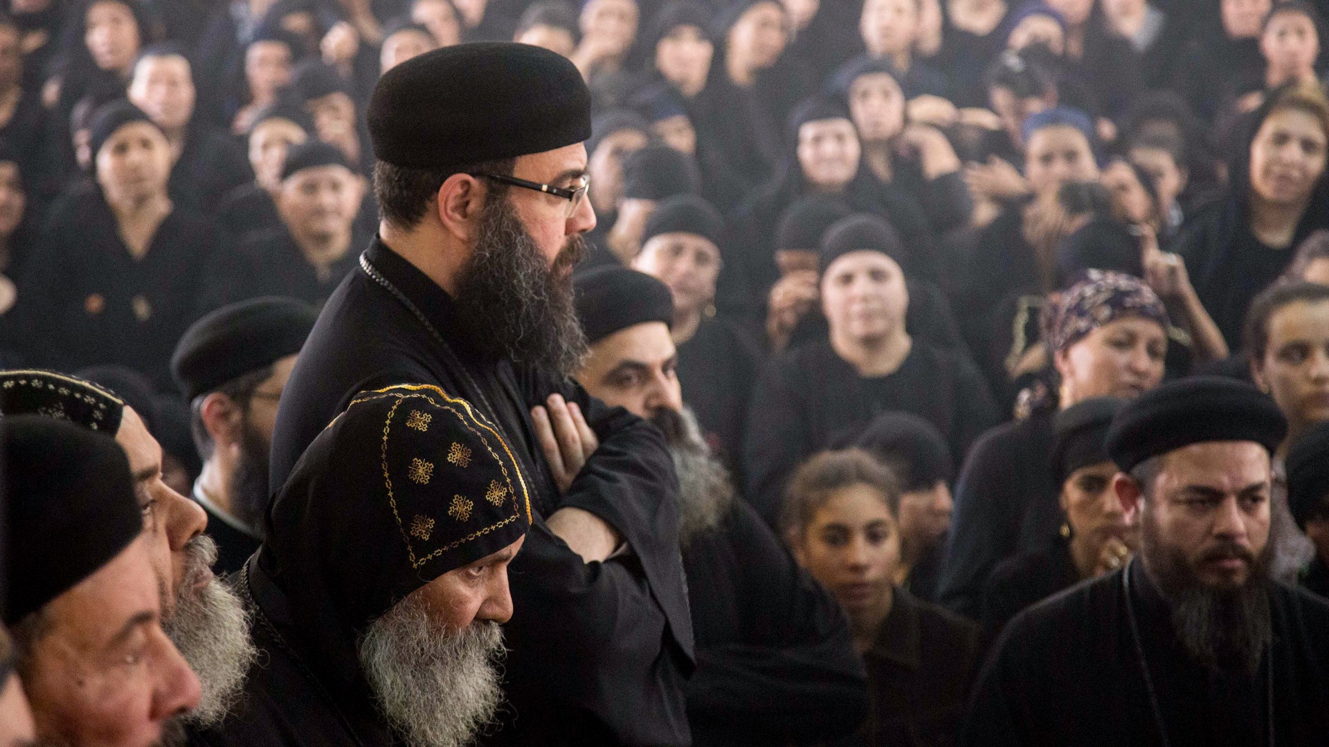 Prayers in Deir El-Garnouse Coptic church in Egypt for victims of a terrorist attack.
