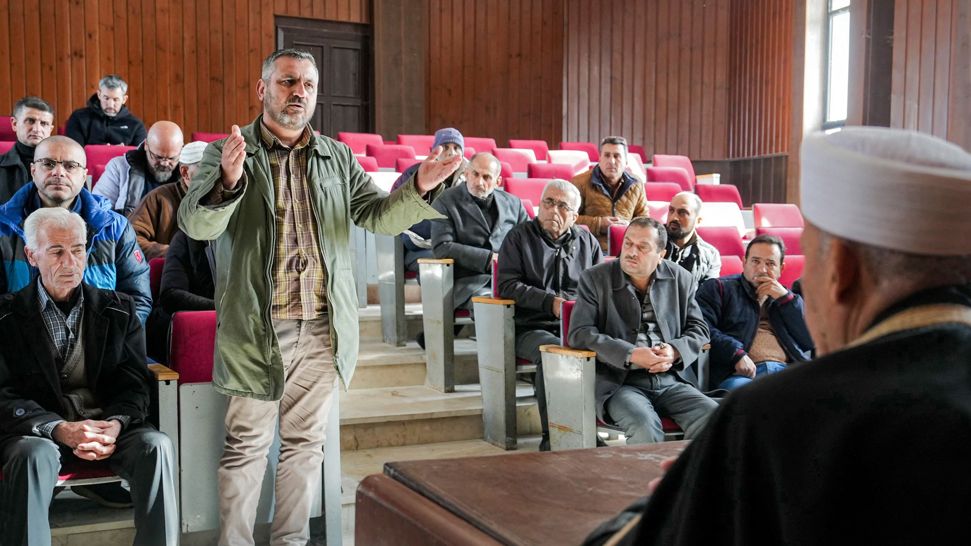 Clerics and members of the Alawite minority gather for a meeting in Syria.
